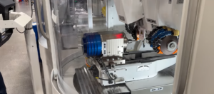 WALTER Helitronic Mini Plus performing 5 axis CNC grinding with FANUC LR Mate robotic loader for automated, high-volume tool production.